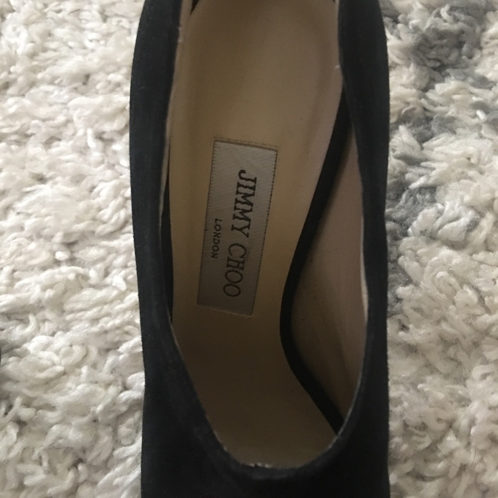 Two pairs of JImmy Choos.